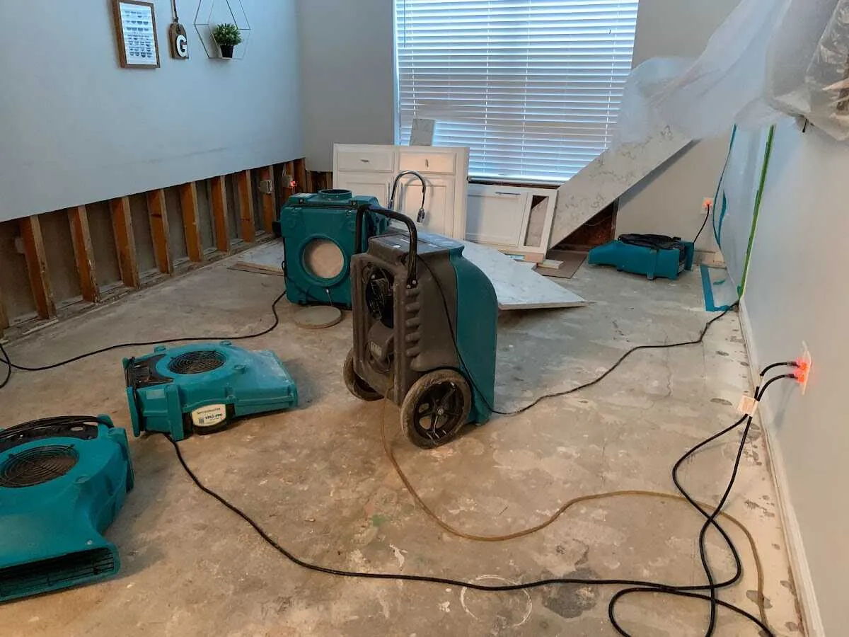 Dehumidifier in flood-cut room for Water Damage Restoration in Newington Forest