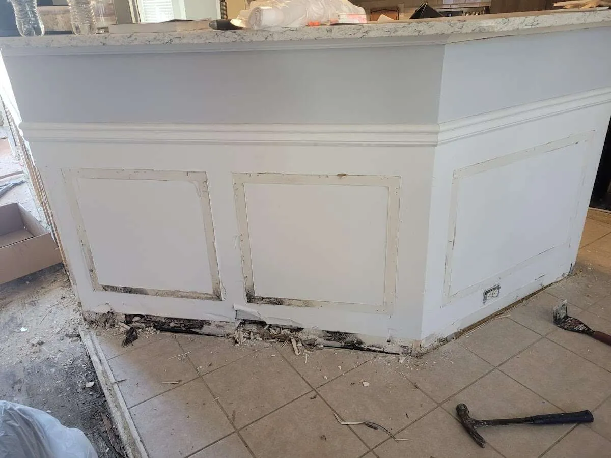 Water damage and mold on kitchen during Storm Damage Restoration in Newington Forest